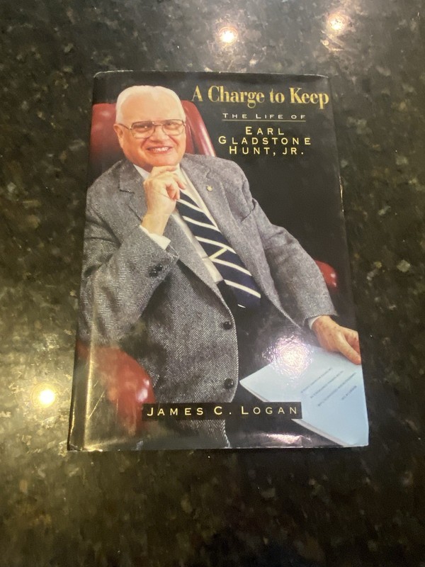 A charge to keep The Life Of Earl Gladstone Hunt, Jr. James C Logan hardcover