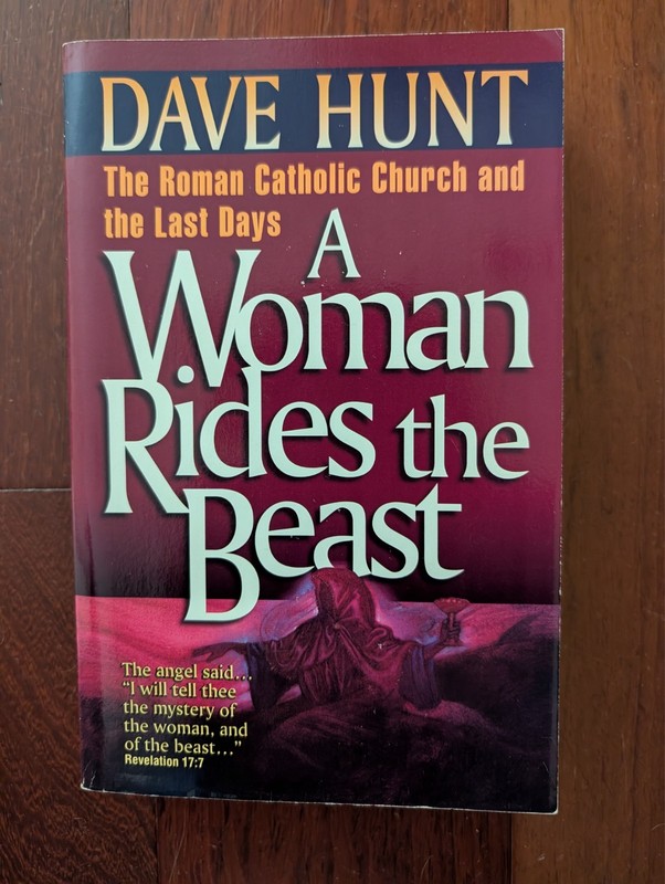 A Woman Rides the Beast: The Roman Catholic Ch- 1565071999, Dave Hunt, paperback