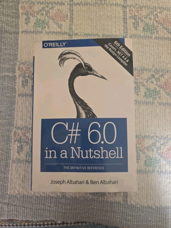 C# 6. 0 in a Nutshell : The Definitive Reference by Joseph Albahari and Ben…